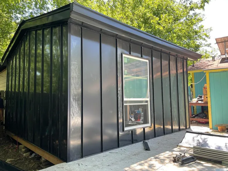 Black standing seam metal wall panels for Metal Roof Installation in Old Fig Garden