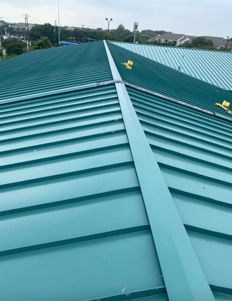 Green commercial metal roof ridge and valley for Metal Roof Repair in Old Fig Garden